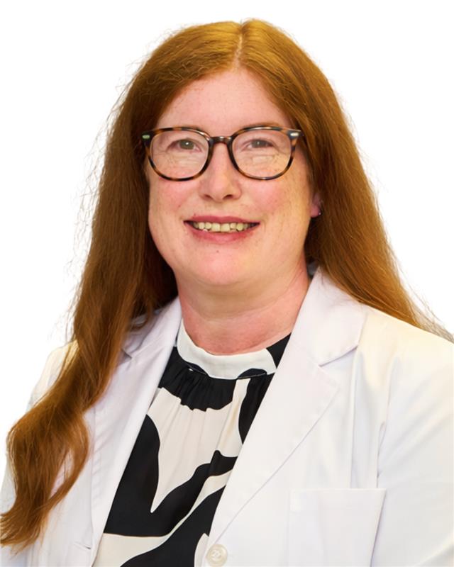 Erin Harrington, MidSouth Pain Treatment Center Team Member Erin Harrington, team member at MidSouth Pain Treatment Center, professional headshot in a white lab coat.